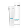 Load image into Gallery viewer, Blue M toothpaste tube standing next to its matching white packaging box on a clean white background.
