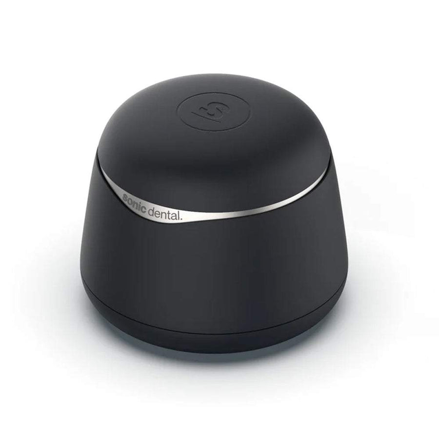 Black Sonic Pro dental appliance cleaner with 'Sonic Dental' branding on a white background