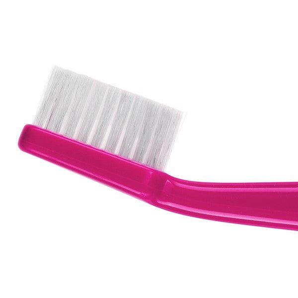 TePe Select Compact Medium Toothbrush with pink handle and compact brush head.